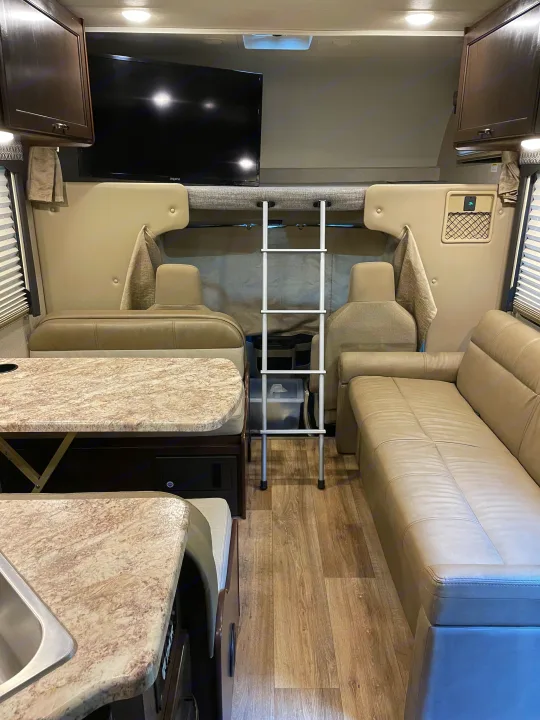 Main coach area provides plenty of space to watch a movie or play games.  USB charging ports available!. Thor Four Winds 2020