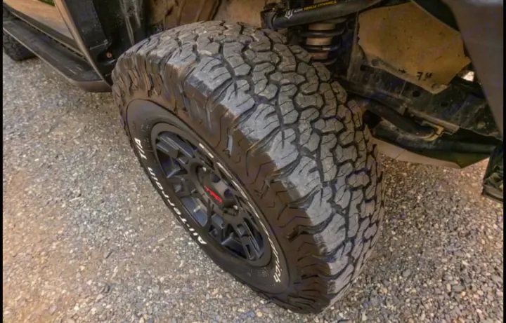 Close-up of a vehicle's BFGoodrich All-Terrain tire on a TRD wheel, with ICON suspension. Ideal for an adventurous rv rental journey.. Toyota Other 2010