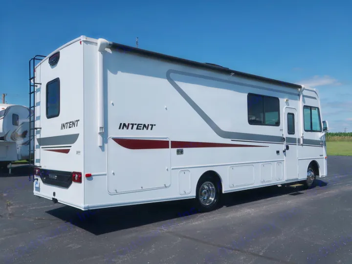 Large white "Intent" Class A motorhome, ready for rv rental. Shows side profile with awning & rear ladder.. Winnebago Winnebago 2020