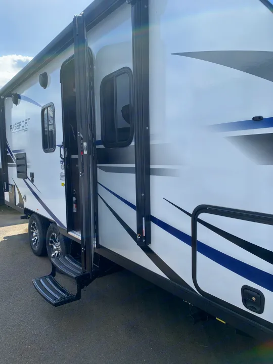 Plenty of storage space. Roll out awning.. Keystone Passport 2021