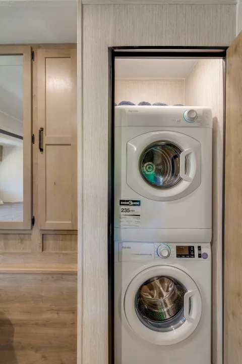 This RV rental features a compact stacked washer/dryer, offering ultimate convenience for laundry during your trip.. Palomino Puma Park Trailer for Temporary Housing 2021
