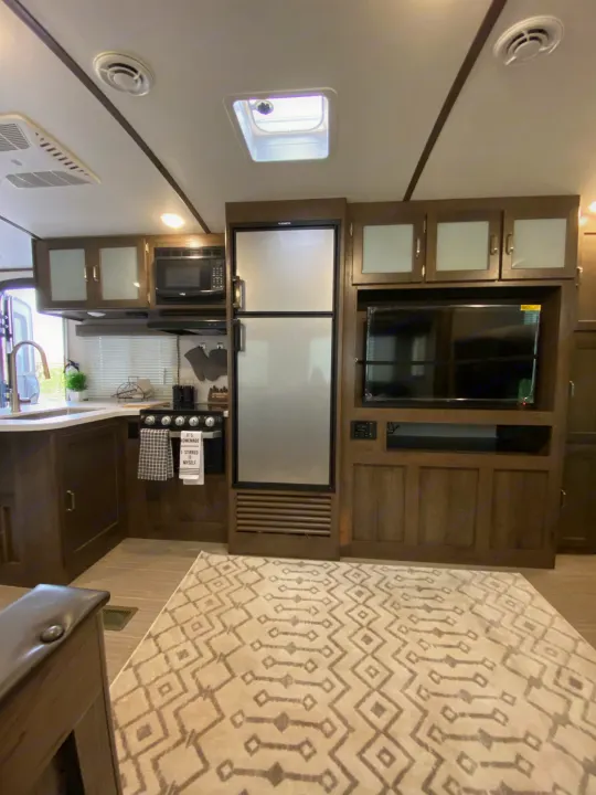 Plenty of room with decent size fridge and appliances. Keystone Passport 2021