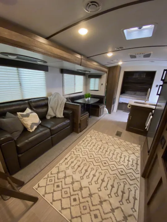 Extension makes for a well sized family hang out space. Keystone Passport 2021
