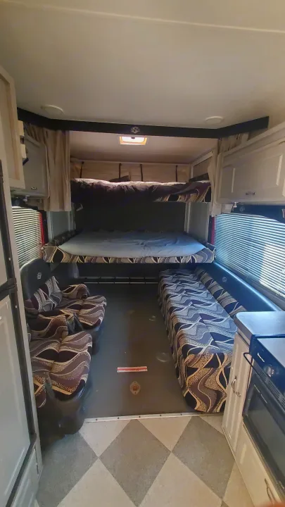 Two electric slide down queen beds . Weekend Warrior Superlite Toy Hauler 2008
