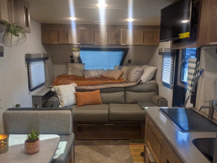 Couch folds down creating a nice cozy queen. Bring your favorite blankets and pillows to make it your home away from home. Also comes with a TV!!. Other Other 2021