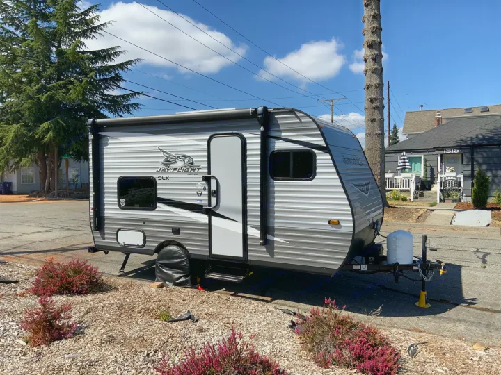 This is the trailer parked along a street. Jayco Jay Flight 2021
