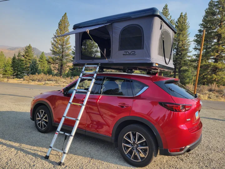 Red Mazda CX-5 with rooftop tent & ladder. Enjoy car camping adventures without a full RV rental.. Mazda Campervan 2018