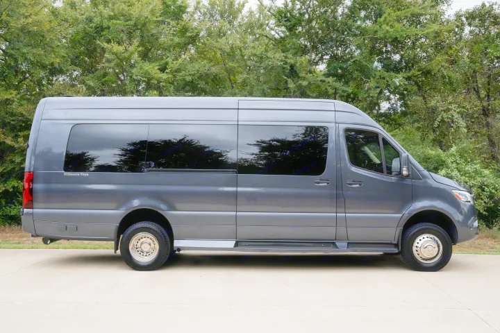Sleek gray Mercedes Sprinter conversion van, perfect for your next rv rental adventure. Side profile with tinted windows.. Ultimate Toys Ultimate Traveler 2022