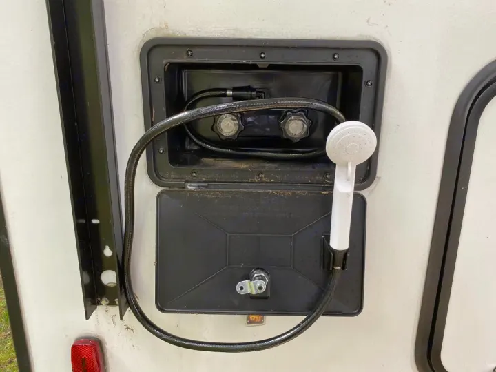 External RV rental shower with hot & cold water controls. Great for rinsing off pets or gear outdoors!. Other Passport 2020