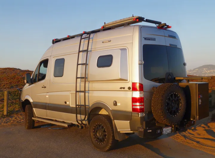 Silver Winnebago Sprinter 4x4 camper van, equipped for adventure. Ideal for your next **rv rental** trip!. Winnebago Revel 2019