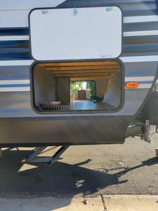 This RV's open pass-through storage offers ample space, perfect for organizing your gear for your rv rental trip.. Grand Design 265bh 2021