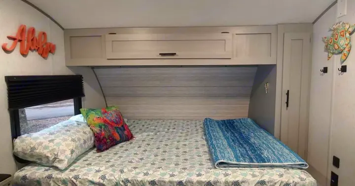 Queen Murphy bed that can be put away for access to the plush sofa.  3" topper provided for comfort.. Forest River Salem 2022
