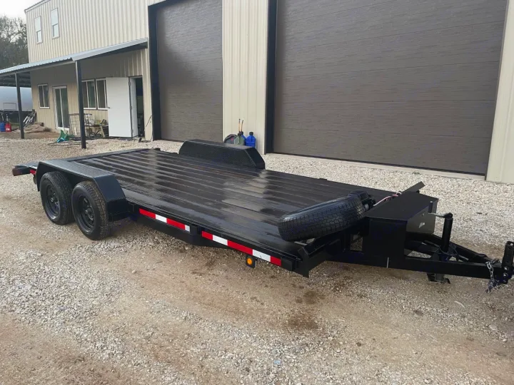 New black two-axle car hauler trailer. Useful for vehicle transport, even with an RV rental.. Other Other 2020