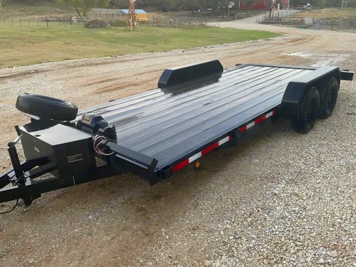 This new black tandem-axle utility trailer is ideal for hauling vehicles or equipment for your RV rental trip. Spare tire & winch included.. Other Other 2020