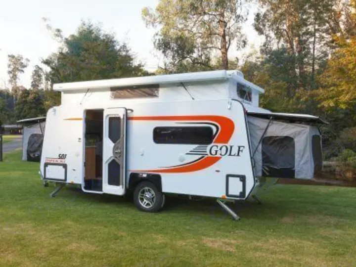 This Golf expander RV rental offers spacious camping with pop-out beds and an open door, perfect for your next outdoor adventure.. Golf Maxxi 501-1 2021