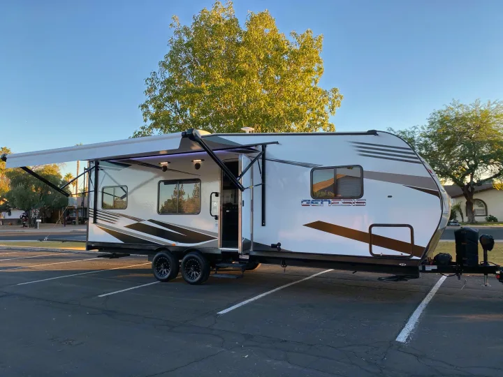 Power awning, porch lights, 2 stereo speakers outside. . Genesis Supreme Rv Genesis Supreme 2022