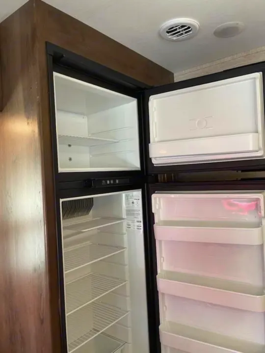 RV rental fridge and freezer open, empty and ready for your supplies.. Ford Ford 2022