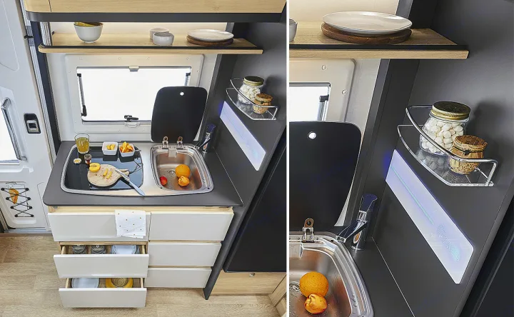 This modern RV rental kitchen includes a compact sink, stovetop, and smart storage with pull-out drawers & shelves.. ITINEO CS660 2022