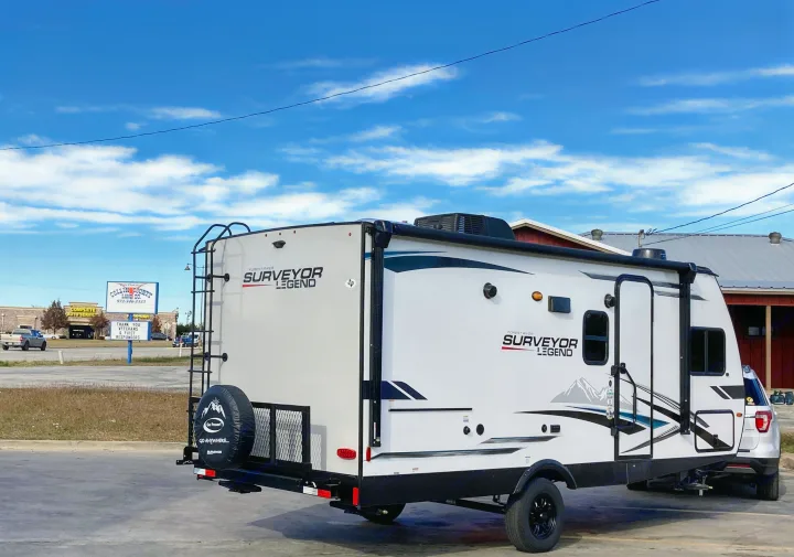 Forest River Surveyor Legend RV rental travel trailer, ready for adventure on a sunny day.. Forest River Surveyor Legend 2022
