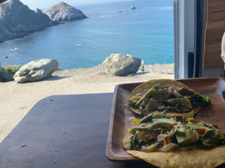 RV rental breakfast tacos with a stunning ocean and cliff view.. Dodge Ram Promaster 2500 2017