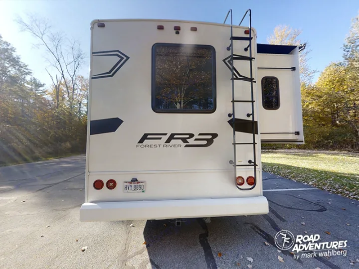 Ready for adventure! Rear view of a Forest River RV rental with extended slide, ideal for camping road trips.. Forest River Fr3 2021