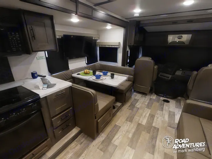 Spacious RV rental interior featuring a full kitchen, dinette, and cockpit, perfect for road adventures.. Forest River Fr3 2021