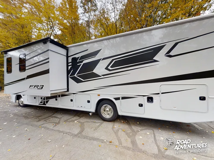 Explore with this spacious white RV rental, featuring a sleek design & slide-out. Perfect for your next autumn road adventure.. Forest River Fr3 2021