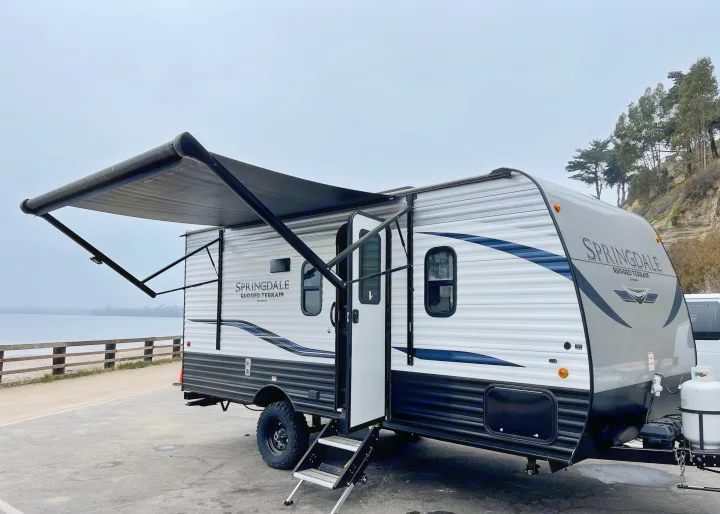 Our Springdale Rugged Terrain RV rental by the coast offers an extended awning and scenic views, perfect for your adventure.. Keystone RV Springdale 2021