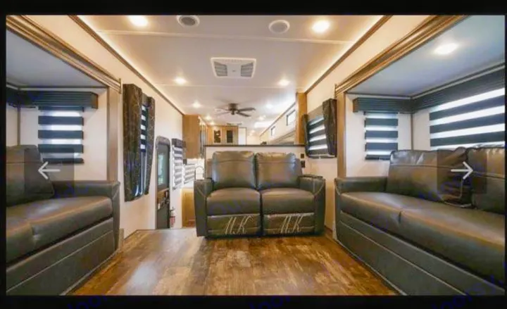 Open spacious living room with a 52"tv. . Forest River Sabre 2021