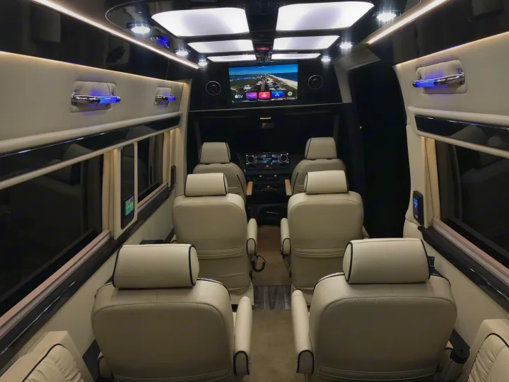 Six Captain Chairs, including front driver and passenger seats. Midwest Automotive Designs Ultimate Coach 2022