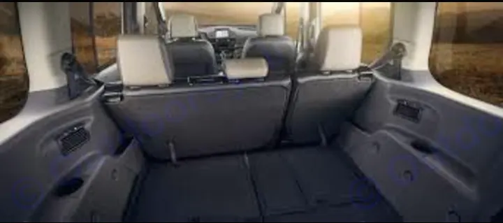 Spacious vehicle interior: rear seats folded flat, revealing ample cargo space. Perfect for an RV rental trip!. Other Other 2014