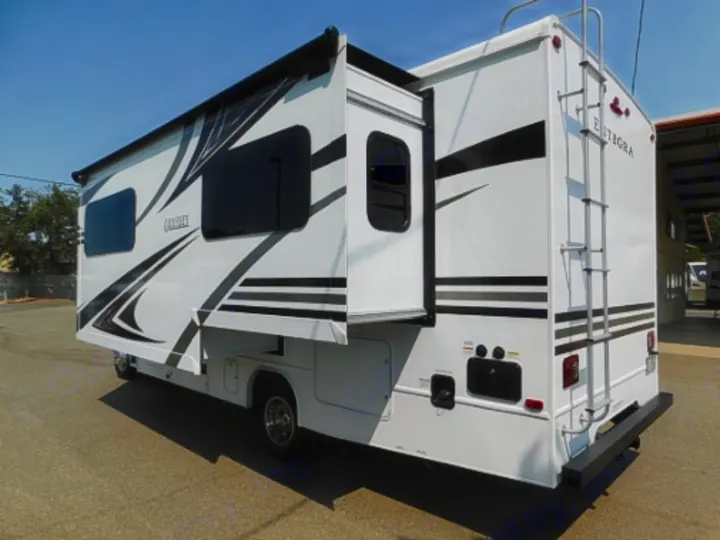 Entegra RV rental with extended slide-out, bold black and grey stripes, and rear ladder. Perfect for travel.. Entegra Coach Odyssey 2019