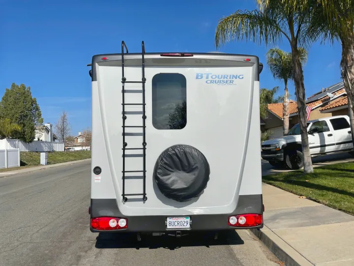 Rear end of RV with ladder and hitch. Gulf Stream B Touring Cruiser 2021