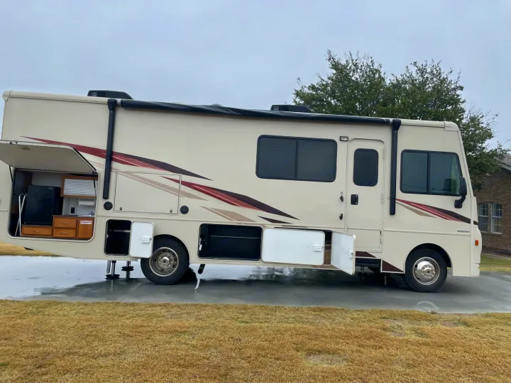 Explore with this RV rental! Features open compartments, an outdoor kitchen, and spacious storage for your next motorhome adventure.. Winnebago Sightseer 2019