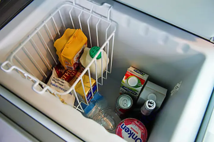 RV rental fridge essentials: cheese, milk, drinks, & yogurt. Ready for your adventure on the road!. Volkswagen California Ocean 2024