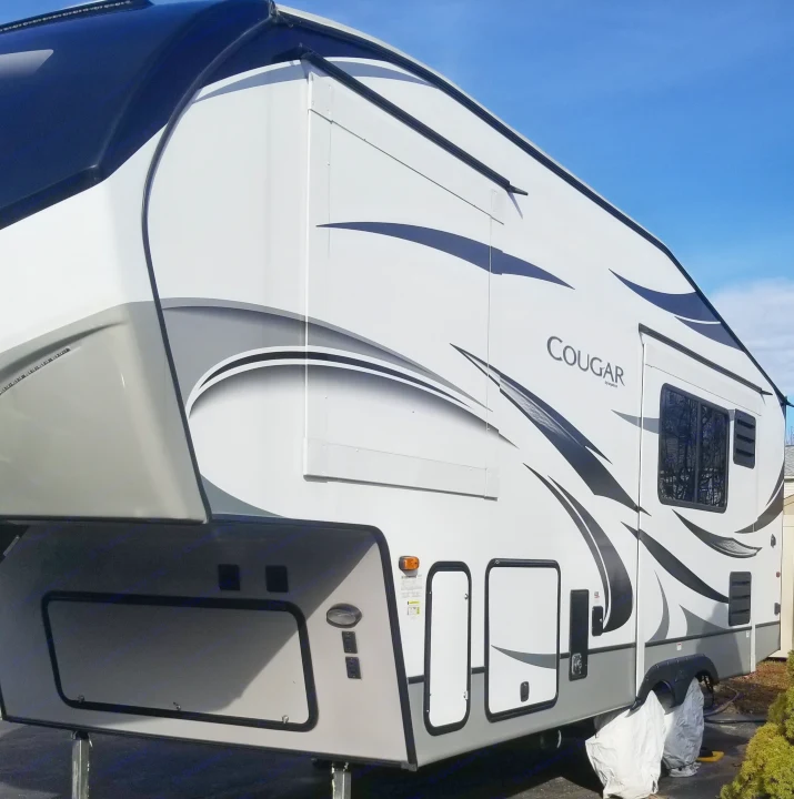 Wardrobe slide and Lounge/refrigerator w/ freezer slide. Keystone RV Cougar 2020
