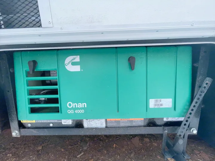 A Cummins Onan QG 4000 generator, providing essential power for your RV rental adventures.. Thor Four Winds 2021