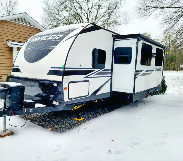 View of our 31' Prime Time Tracer with the living area slide, pushed out. . Forest River Tracer 2019