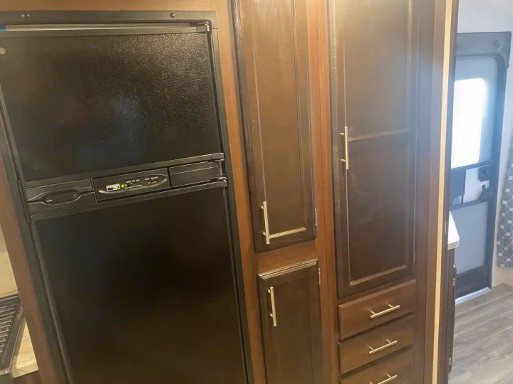 This white Stealth RV rental trailer, equipped with a side ladder, is ready for outdoor adventures.. Jayco Jay Flight SLX 2019