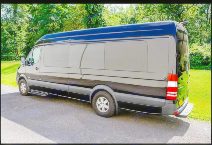 Sleek black Mercedes Sprinter van, available for RV rental, parked. Its long body, privacy tinted windows, and rear step are visible.. Mercedes-Benz Sprinter 2500 2016