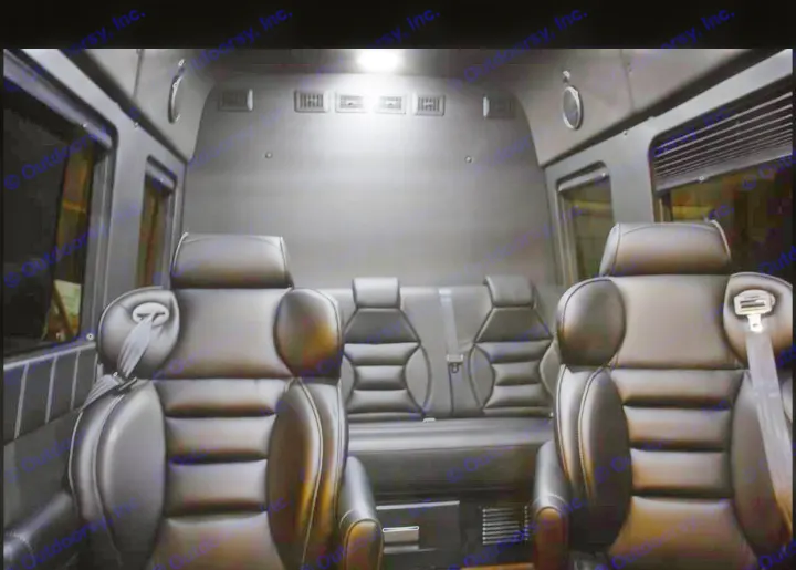Spacious, dark RV rental interior with plush black leather seats, perfect for luxury travel.. Mercedes-Benz Sprinter 2500 2016
