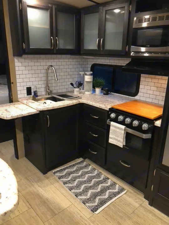 Note the grand counter space with the L Shape, along with the pop out counter beside the sink for even more!. Grand Design Imagine 2018