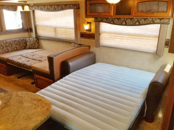 Dining room/ Living room converted to sleeping quarters. . Keystone RV Springdale 2013