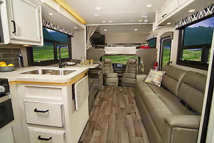 Beautiful Farmhouse Designed Interior with tons of room using the huge slide out. Entegra Coach odyssey 2022