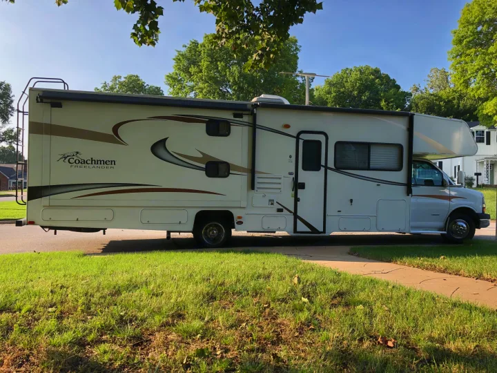 This Coachmen Freelander RV, with an awning and ladder, is ideal for an RV rental adventure.. Coachmen Freelander 2014