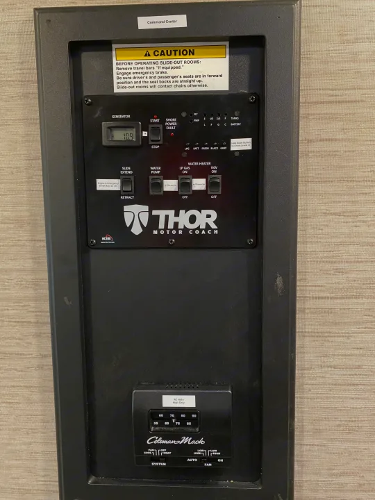 RV rental's command center: managing generator, slide-outs, water, tank levels, and AC for comfortable camping.. Thor Magnitude 2022