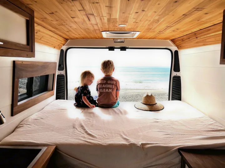 Raised Full size rear bed fits two adults. Ram Promaster 2500 2014