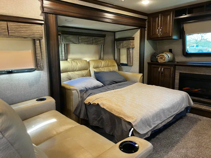 Front couch open into bed . Keystone Alpine 2019