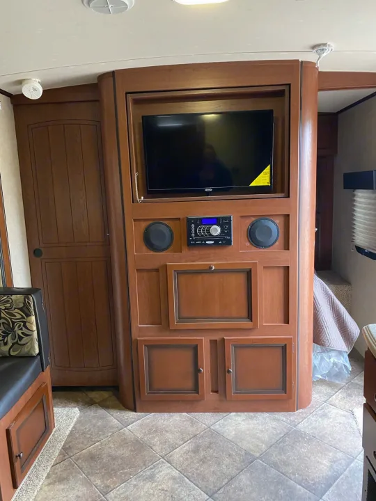 large TV with speakers and built in DVD player. Forest River Solaire 2014
