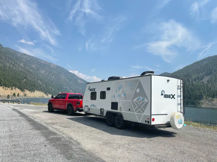 Pictured with a Ram 1500 for towing, dry weight is 4100 lbs.. Forest River Ibex 19MBH 2021